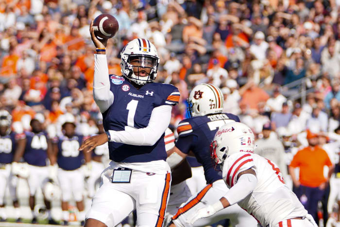 Dec 28, 2021; Birmingham, Alabama, USA; Auburn Tigers quarterback TJ Finley (1) passes against the Houston Cougars during the second half of the 2021 Birmingham Bowl at Protective Stadium. Mandatory Credit: Marvin Gentry-USA TODAY Sports
